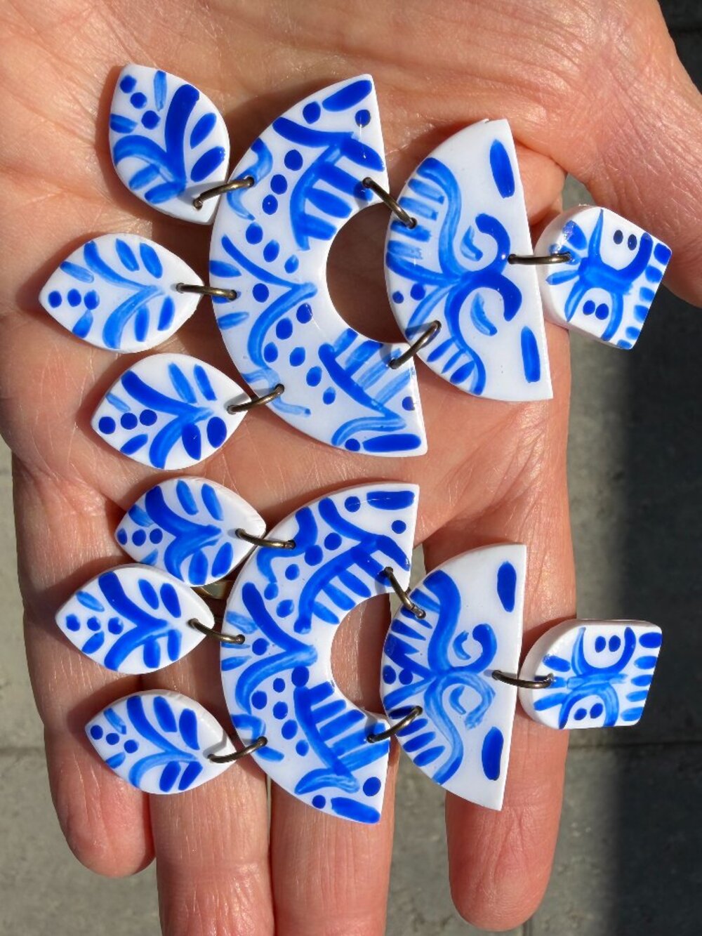 Charming Anthropologie blue and white hand-painted ceramic earrings, 3" long